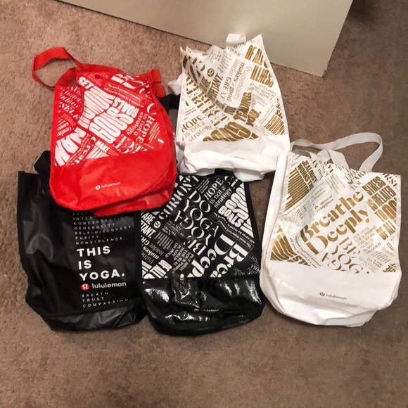 lululemon athletica Handbags - 5 small lululemon reusable shopping bags.